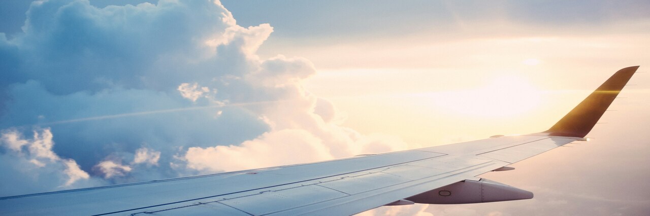 airplane above the cloud