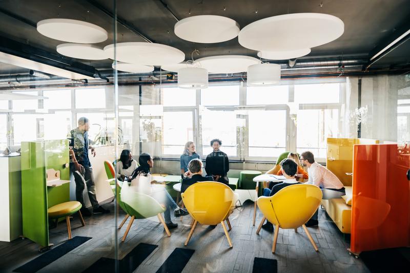 co workers in meeting room