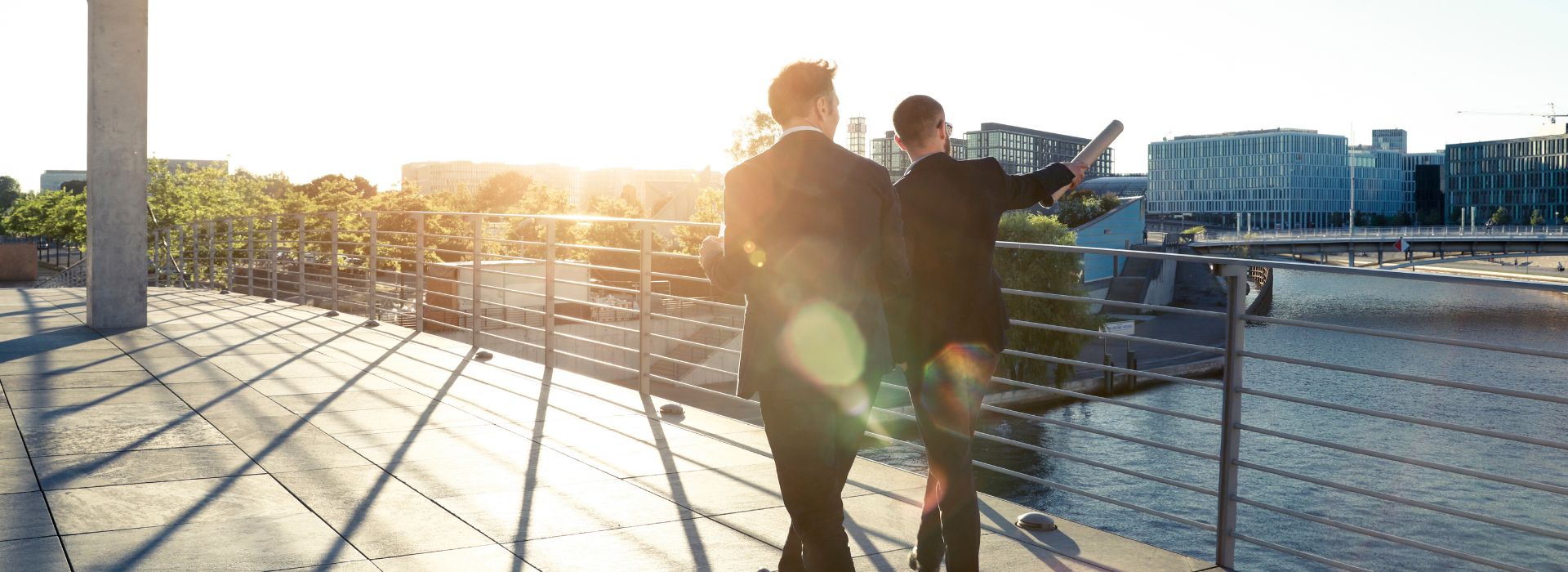 Two businessmen walking in the financial district of the city