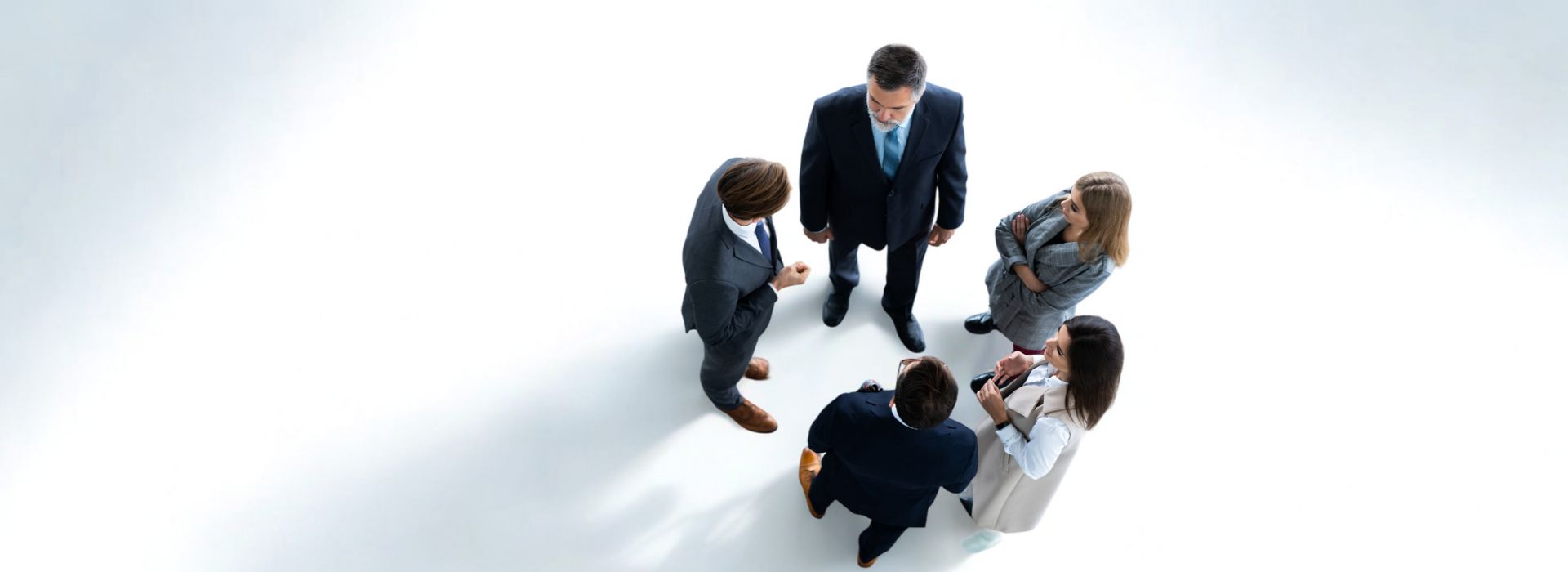 Top-view-of-five-business-people-having-a-Business-meeting-and-teamwork