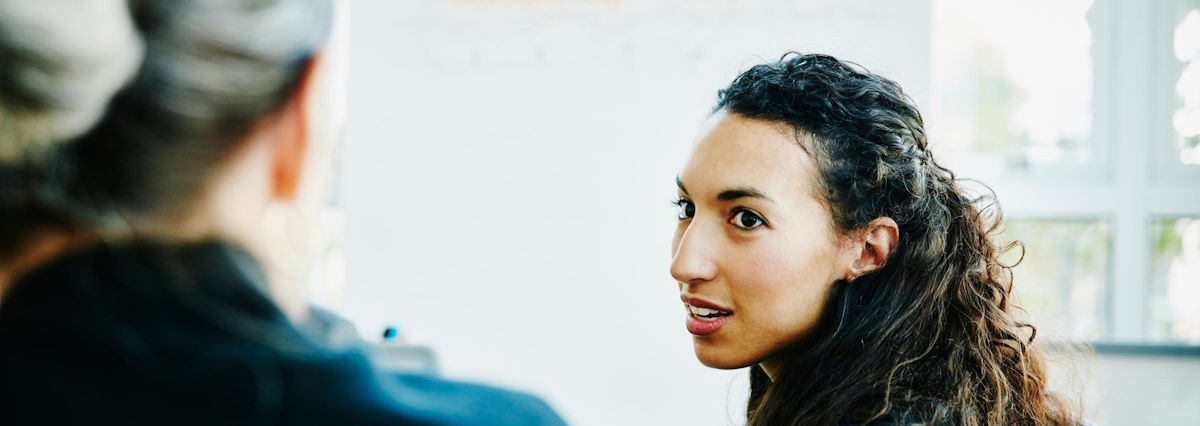 2 women talking about climate risk intelligence